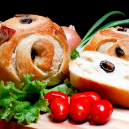 Deliciosa receta de pan gourmet con aceitunas, cebolla y tomates inspirada en el estilo tagliatella. ¡Prueba esta combinación de sabores única!